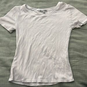 white t shirt, a little shorter then normal